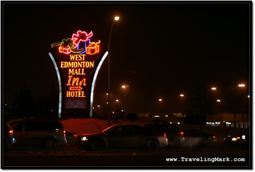 Photo: Sign on the Corner Marking West Edmonton Mall at Night