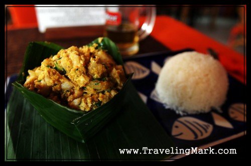 Curry Fish Served in a Banana Leaf with Rice - My First Meal in Cambodia