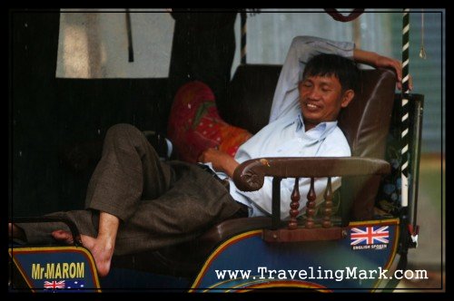 Tuk Tuk Driver Taking a Nap in Rain