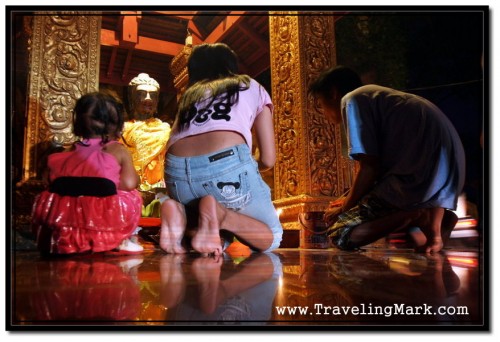 People of All Ages Come to Pray Before the Statue of Ya-Tep