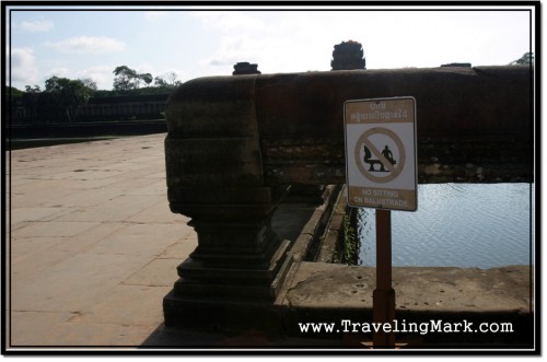 Photo: No Sitting on Balustrade - a Sign Warns
