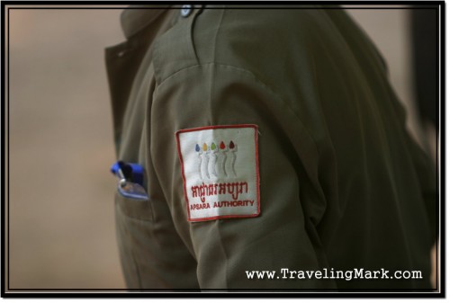 Photo: Apsara Authority Inspector at an Entrance to One of Angkor Temples