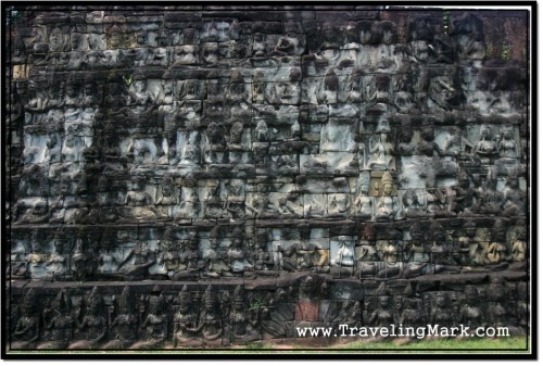 Photo: Terrace of the Leper King Wall with Seven Rows of Extensive Bas Reliefs Photo: Terrace of the Leper King Wall with Seven Rows of Extensive Bas Reliefs