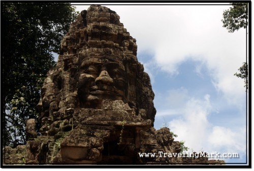 Photo: Faces of Lokeshvara Surmounted Atop the Gate to Banteay Srei Photo: Faces of Lokeshvara Surmounted Atop the Gate to Banteay Srei