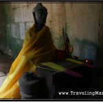 Photo: Small Statue of Buddha Draped in Saffron Robe Located at Ta Prohm Temple, Angkor