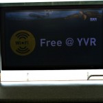 Large Flat Screen TV Advertising Free WiFi at YVR