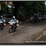 Cambodian Police Escort the Funeral Procession in Siem Reap