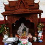 Small Buddha Statue Located at the Rear of the Wat Preah Prom Rath Temple