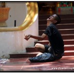 Crooked Beggar who Makes a Lot of Money at the Steps to Preah Ang Chek Preah Ang Chorm Shrine