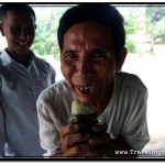 Generous and Welcoming Buddhist Cambodians Offering Me a Sticky Rice Cake