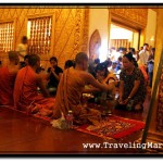 Group of Monks Give Buddhist Devotees Blessings at Preah Ang Chek Preah Ang Chorm Shrine