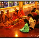 Buddhists Offer Monks Food and Get Blessings on Pchum Ben Festival