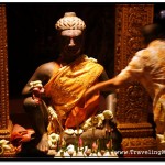 Devoted Buddhist Leaves Offerings for the Statue of Ya-Tep in Siem Reap