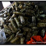 Pile of Sticky Rice Cake Wrapped in Banana Leaves to Preserve Them Without Storing in a Fridge