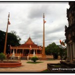 Photo: View of Wat Damnak Temple Courtyard with Central Stupa on the Right