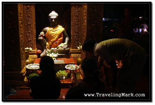 Fruit, Flowers and Burning Incense Sticks Accompany the Prayers of Buddhist Cambodians