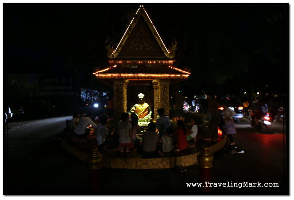 Ya-Tep Shrine in Siem Reap. People are Praying While Traffic Flows By on Both Sides