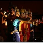 Photo: Dimly Lit Stage with Lights Shining at Apsara Dancers from the Bottom