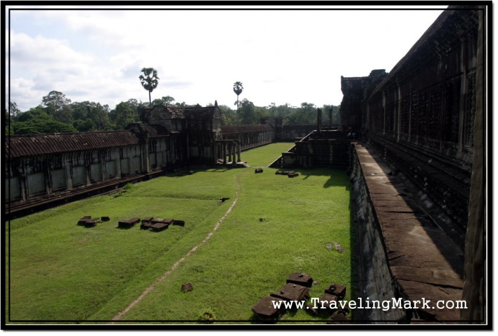 Photo: View of the Grass Covered Area and the Wall from the Second Level of Angkor Wat Temple