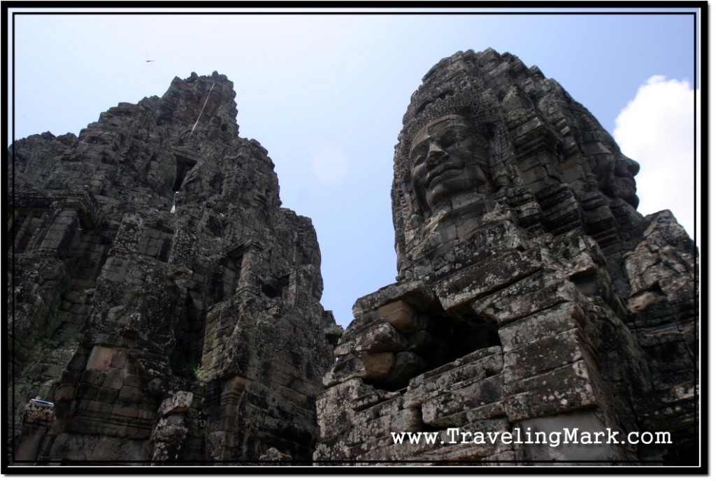 Photo: Bayon Central Sanctuary on the Left, Face Tower on the Right