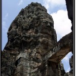 Photo: Stone Frame and a Tower of Four Giant Faces Looking to Cardinal Point