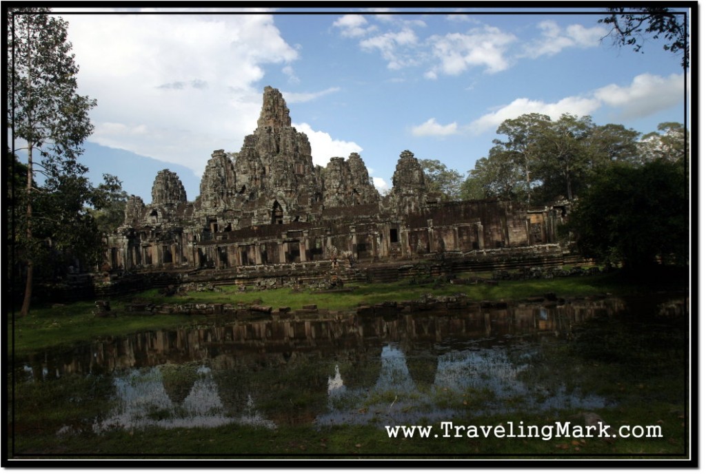 Photo: Bayon Temple in Rainy Season with Reflection in the Water Basin