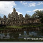 Photo: Bayon Temple in Rainy Season with Reflection in the Water Basin