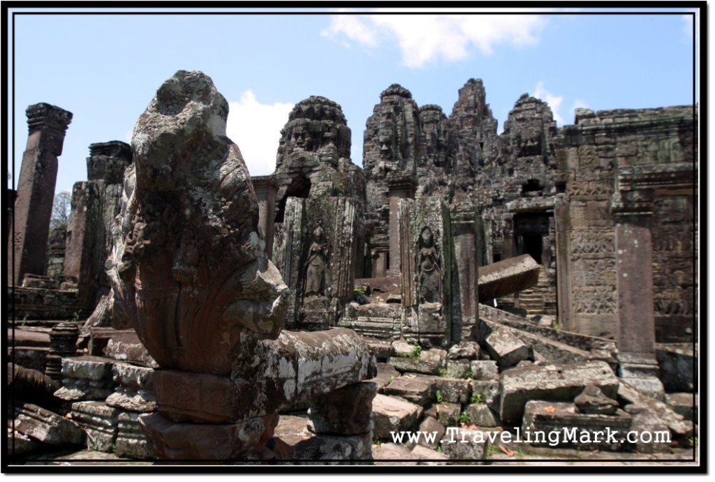 Photo: Head of Naga Serpent Lonely Stands on Guard at the Entrance to Bayon Temple