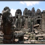 Photo: Head of Naga Serpent Lonely Stands on Guard at the Entrance to Bayon Temple