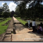 Photo: 172m Long Causeway Leading to the Baphuon Temple with Lazy Locals Killing Time