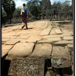 Photo: Tourist Walking Towards East Entrance of Bayon Temple