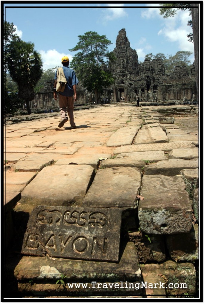 Photo: Tourist Walking Towards East Entrance of Bayon Temple