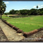 Photo: Line of Trees Along the North Pond of Angkor Wat Hides the Line of Stalls Selling Junk and Refreshment