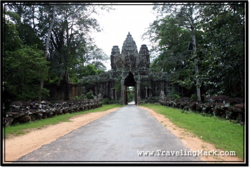Photo: Victory Gate of Angkor Thom with Vandalized Balustrade on Either Side
