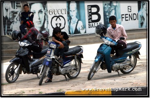 Photo: Lazy Cambodian Youth Killing Time With Their Motorcycles
