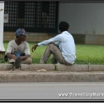 Photo: Common Picture in Cambodia - Instead of Being at Work, Lazy Locals Just Sit Around