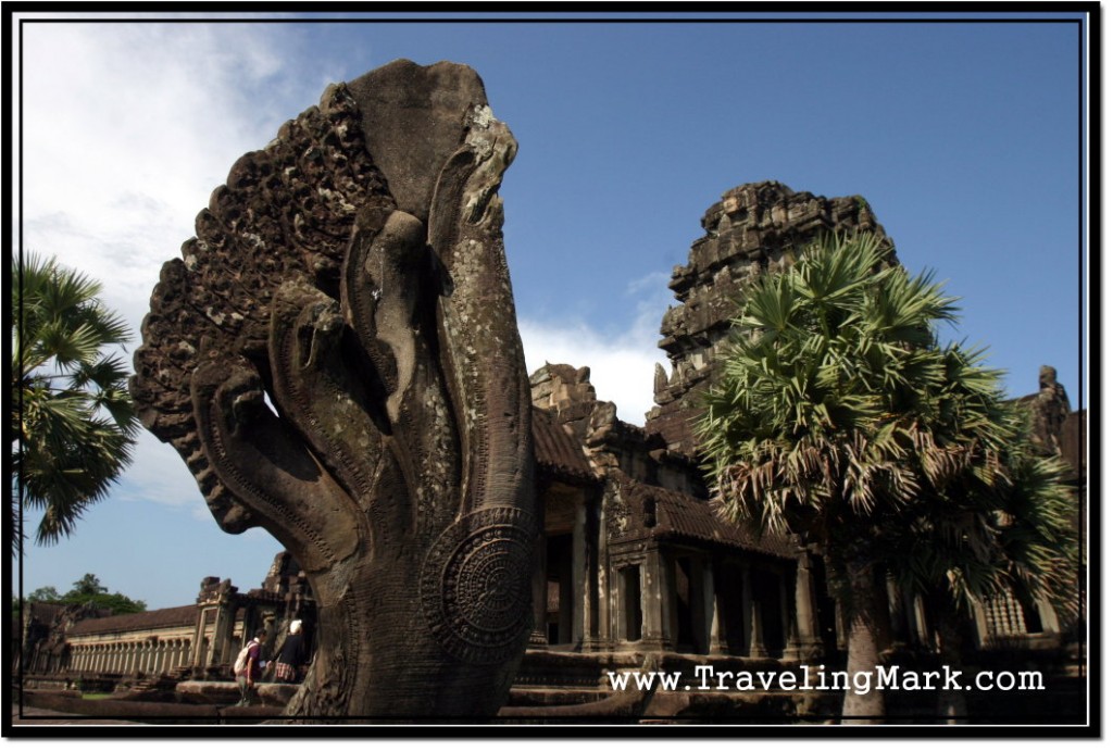 Photo: Partially Damaged Naga Multi-Headed Serpent at the Entrance to Angkor Wat