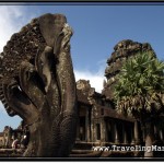 Photo: Partially Damaged Naga Multi-Headed Serpent at the Entrance to Angkor Wat