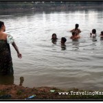 Photo: Villagers Bathing in Sras Srang at Dusk