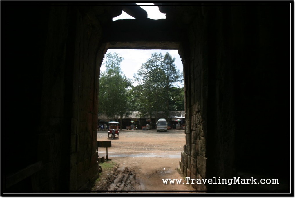 Photo: Angkor Hustler Stalls Seen Through the Gate of Ta Prohm