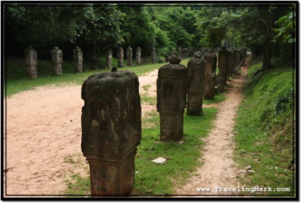 Photo: Dirt Road Leading To and From Neak Pean is Lined on Both Sides with Gorudas