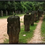 Photo: Dirt Road Leading To and From Neak Pean is Lined on Both Sides with Gorudas