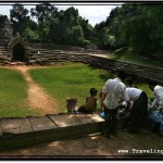 Photo: Cambodian Family Having a Picnic at the Dry Connected Pool of Neak Pean