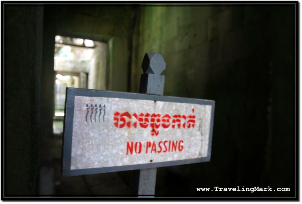 Photo: No Passing Sign Prohibited Access to Parts of Passage with Huge Trees Growing Over Because Stones Could Come Loose Anytime