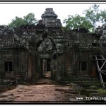 Photo: Ta Som Causeway Over Former Moat with Collapsing Gopura on Inner Enclosure