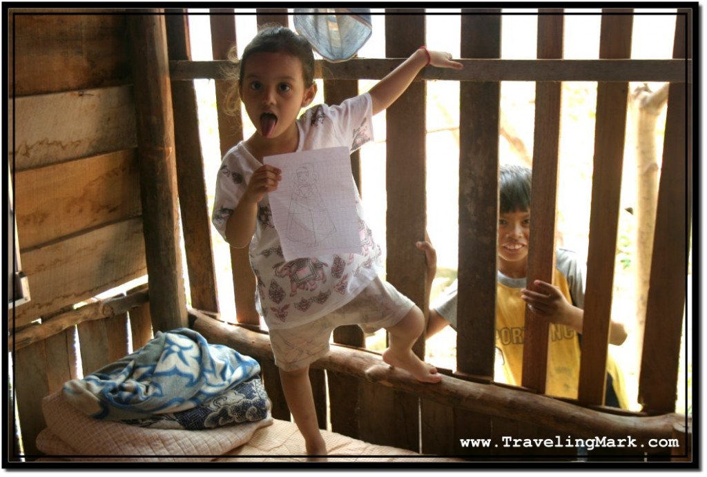 Photo: Ha's Daughter and Some Random Cambodian Boy Who Came to Spy on Us