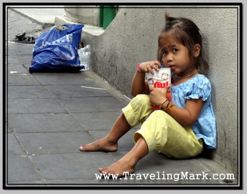 Photo: Begging Child - Not Really Poor, Just Used