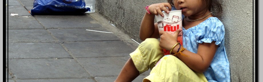 Photo: Begging Child - Not Really Poor, Just Used