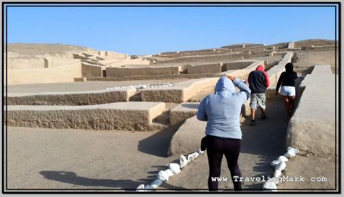 Photo: Tour Goers Holding On to Their Hats While Visiting the Pyramids of Cahiachi