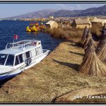 Photo: Boat with Which We Arrived on Uros Island Is Docked on Side of Floating Mass